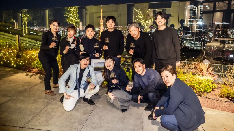 A photo of Braze employees posing together outside